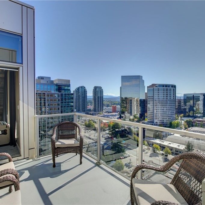 Condo balcony overlooking the Bellevue landscape, managed by Lori Gill & Associates